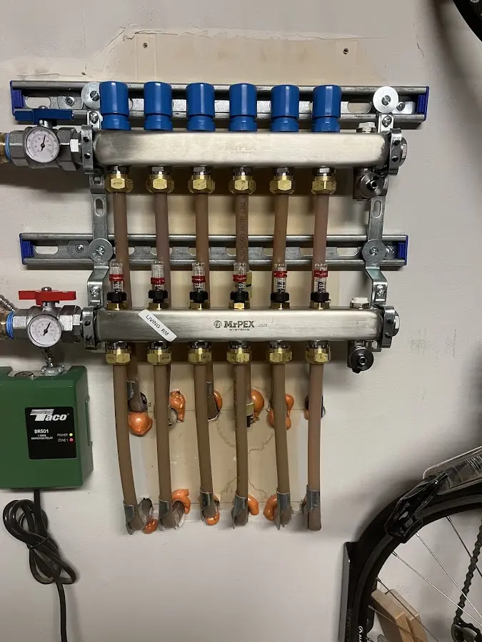 Plumber performing Leak Detection at a residential property in Haddam